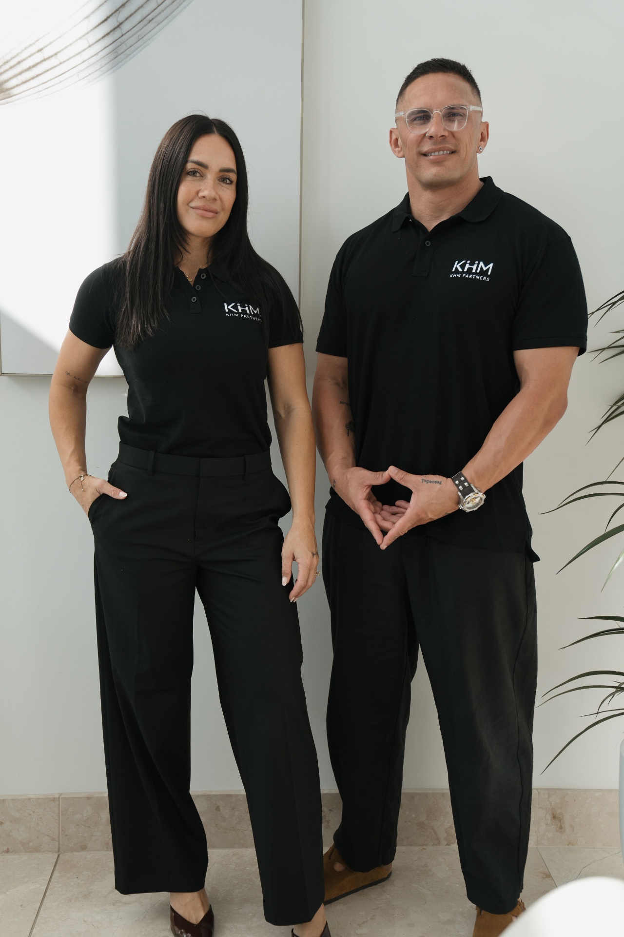 Studio portrait of Watene Waenga and Erin Fale, co-founders of KHM Partners